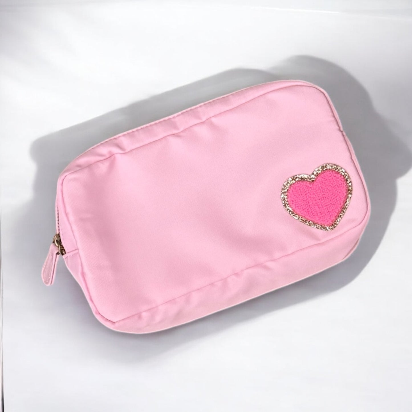 Ready to send small baby pink pouch with hot pink heart